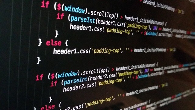 B2B-website-development-cost_Computer-code-on-screen